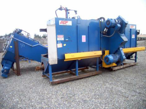 used BCP/Wheelabrator 4 wheel roll machine